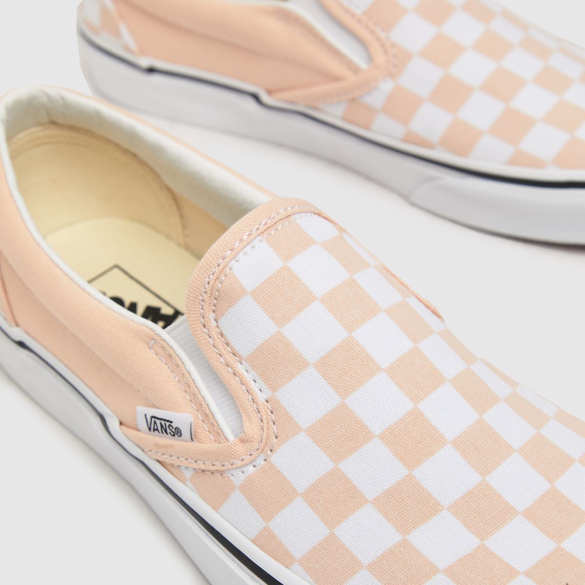 Peach and 2025 white checkered vans